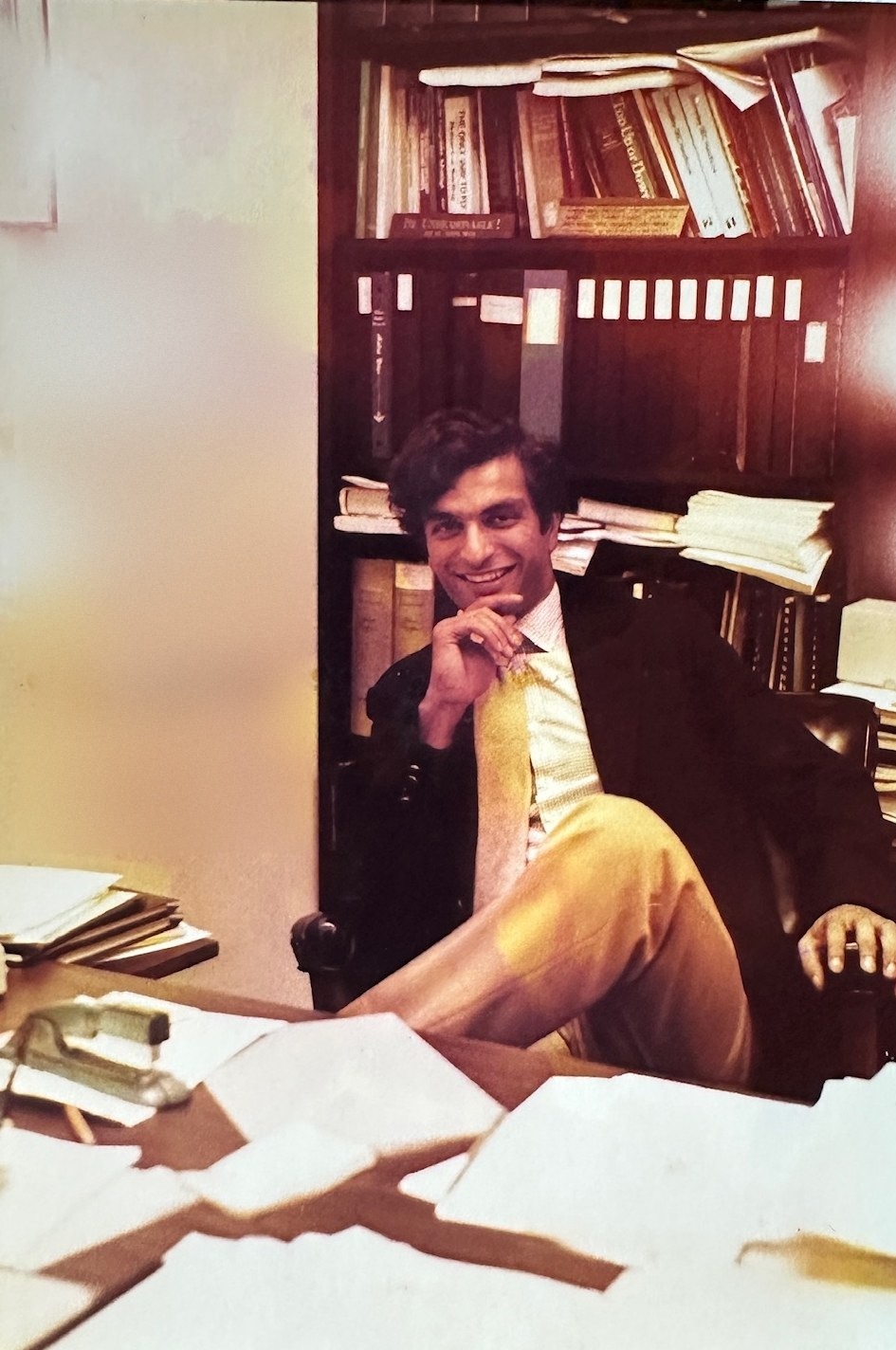 Shaban Alam at his desk, archival photograph