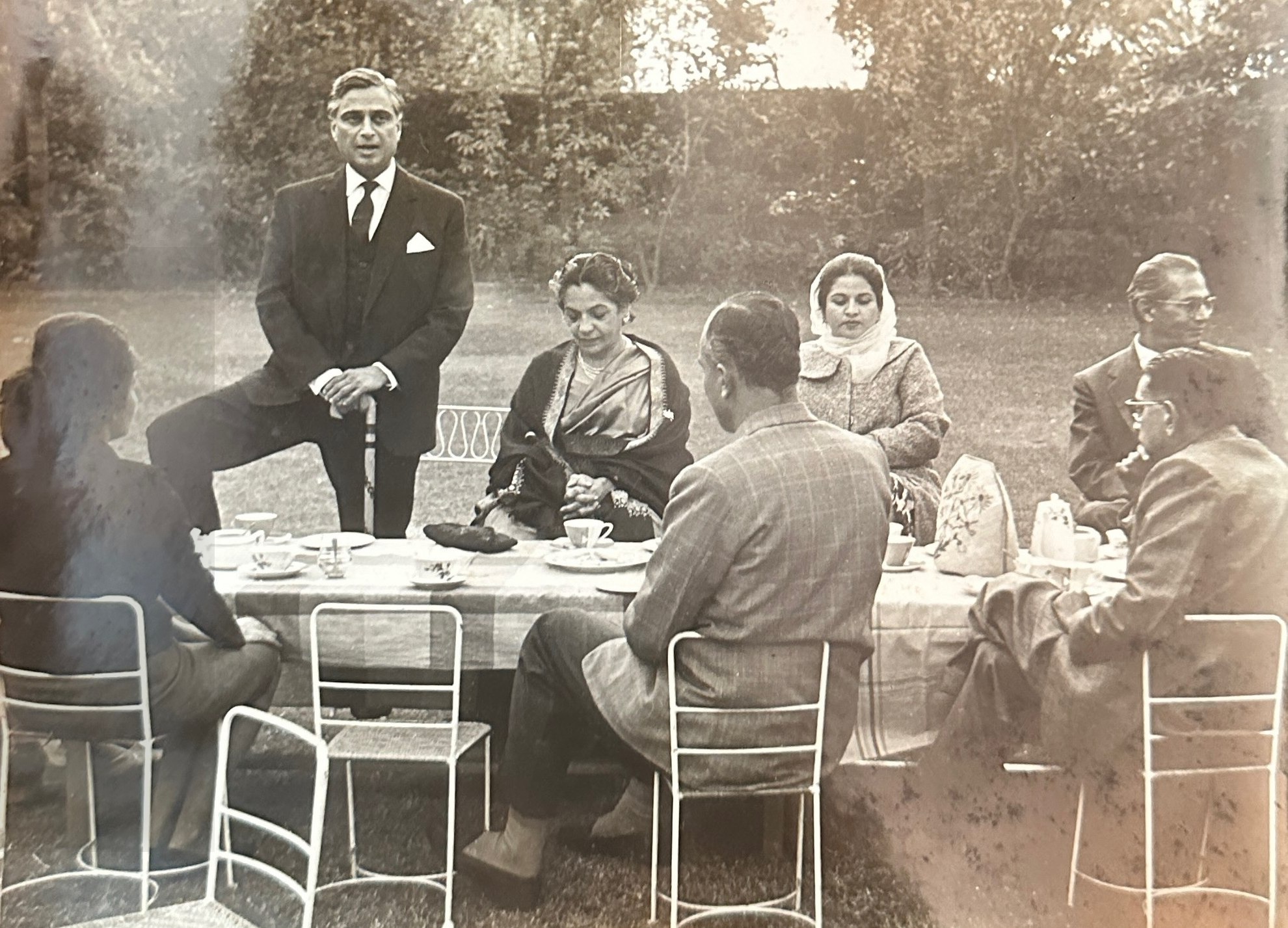 Formal tea gathering in a Lahore garden, archival photograph